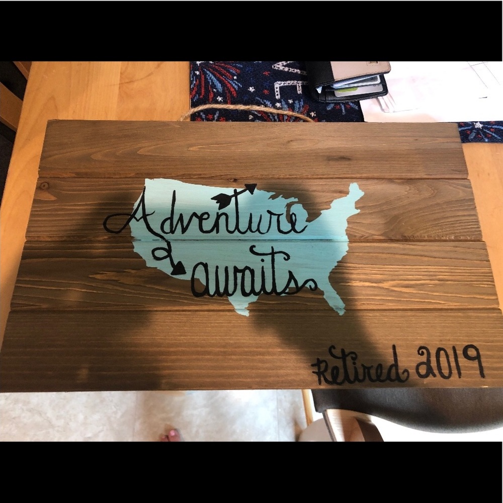Hand painted wooden sign “adventure awaits”